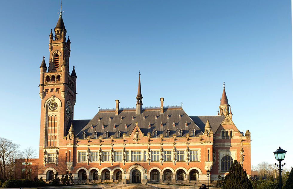 Peace Palace, headquarters of the International Court of Justice in The Hague, Netherlands, with a clock tower on its left side. 