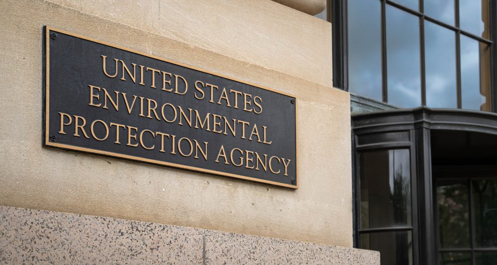 Bronze plaque mounted on an office building wall saying "United States Environmental Protection Agency."