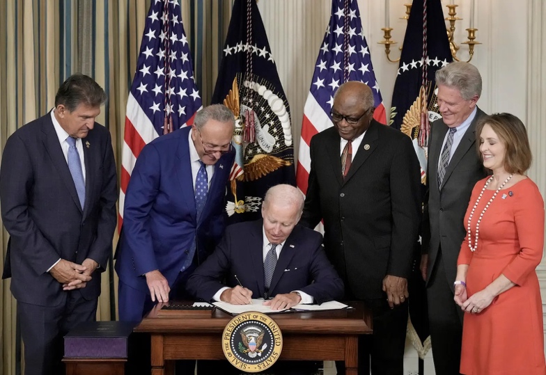 Photograph of President Joe Biden signing the Inflation Reduction Act.