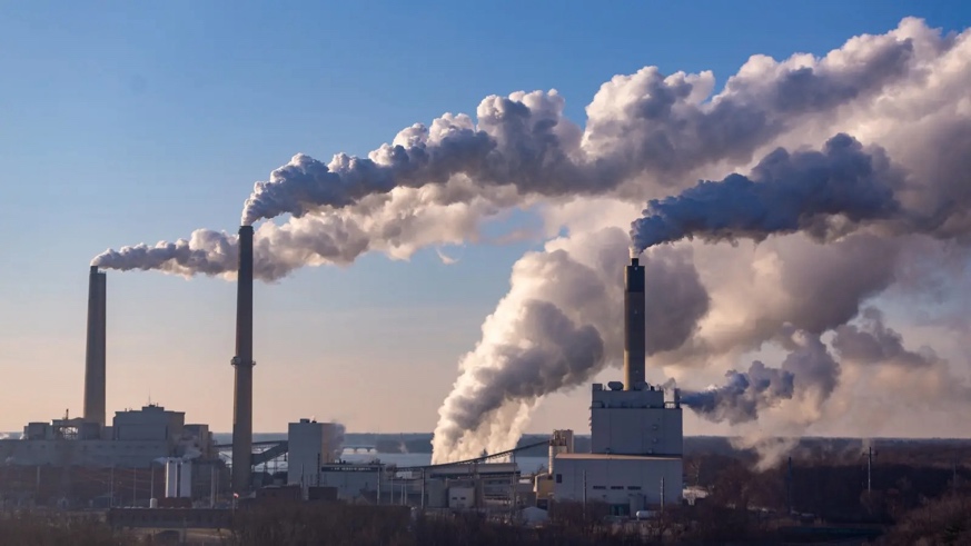 Photograph of smokestacks at a coal-fired generating station. 